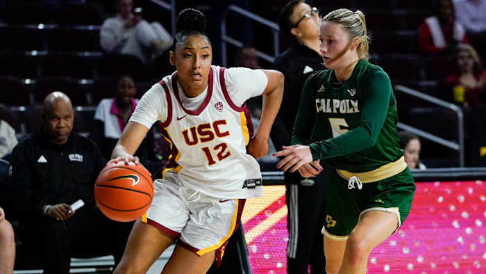 USC guard JuJu Watkins drives to the basket against Cal Poly guard Ania McNicholas during the first half of an NCAA college basketball game, Tuesday, Nov. 28, 2023, in Los Angeles.
